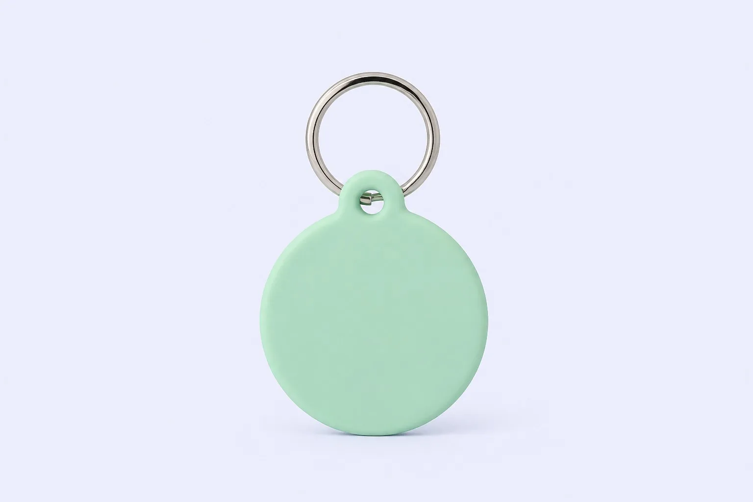 Blank mint green hang tag keychain on a light background