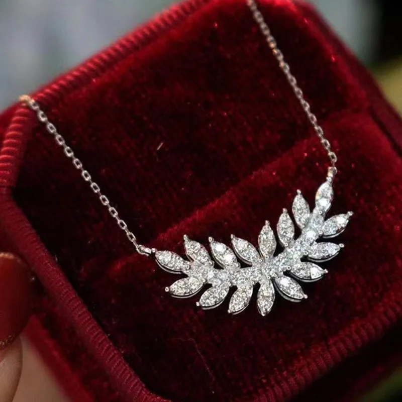 

Idun New Arrival Sparkling Cubic Zirconia Pendant Necklace White Gold Plated Zircon CZ Feather Leaf Necklace for Gifts