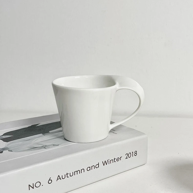 

In stock 200ml Italian espresso spiral handle porcelain mug simple pure white ceramic Milk coffee Cup