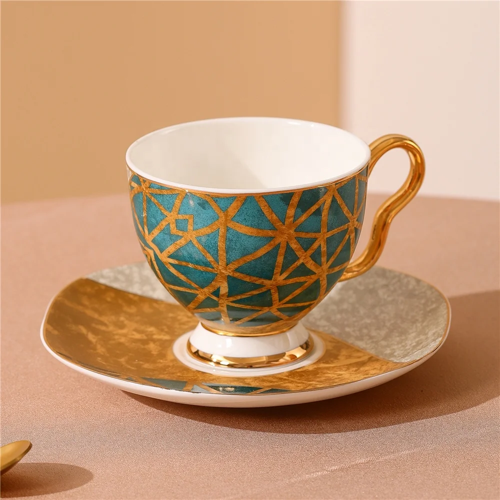 

Luxury decal golden rim design English espresso cups set wholsale bulk Arabic Turkish fine bone China coffee cup with saucer