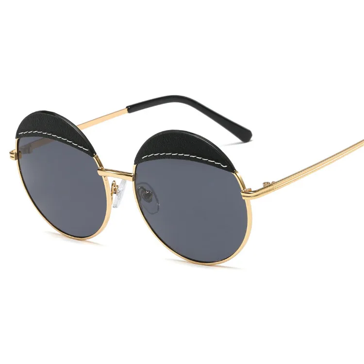 

Hot Sale New metal frame and leg sunglasses fashion ladies round frame leather outfit sun shade anti-UV sunglasses