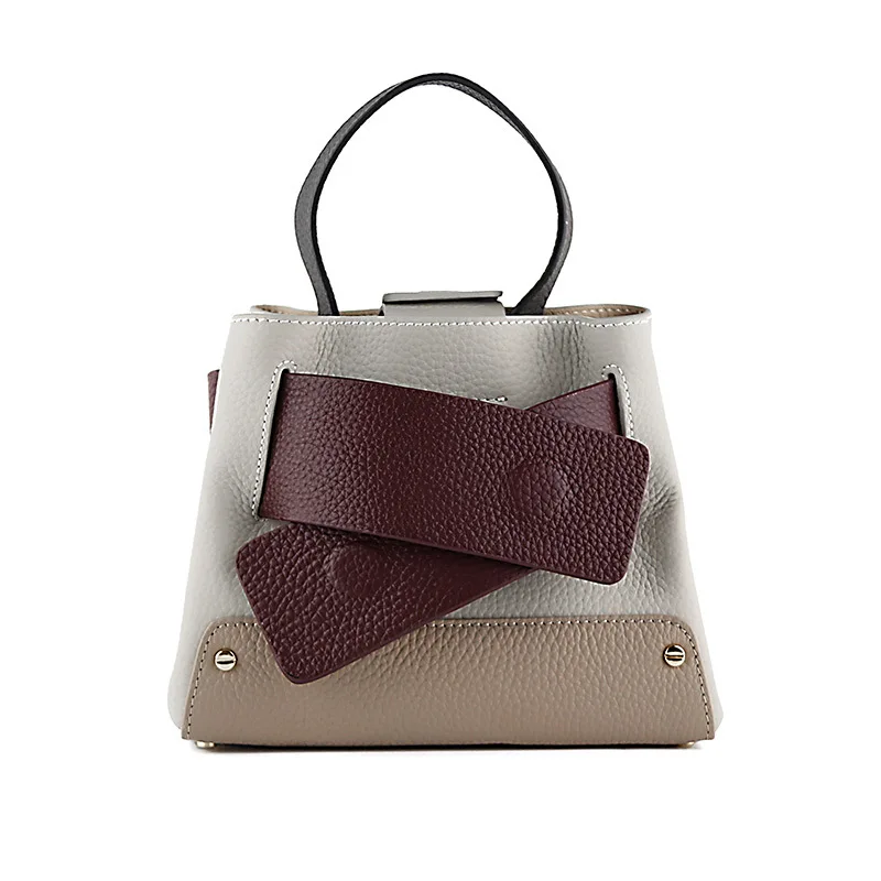 

2021 Hasp design rivet panelled color real leather bucket bag