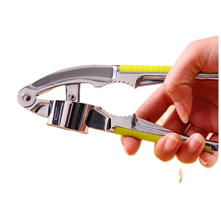 

Multifunctional garlic press manual cutting and squeezing garlic and garlic puree