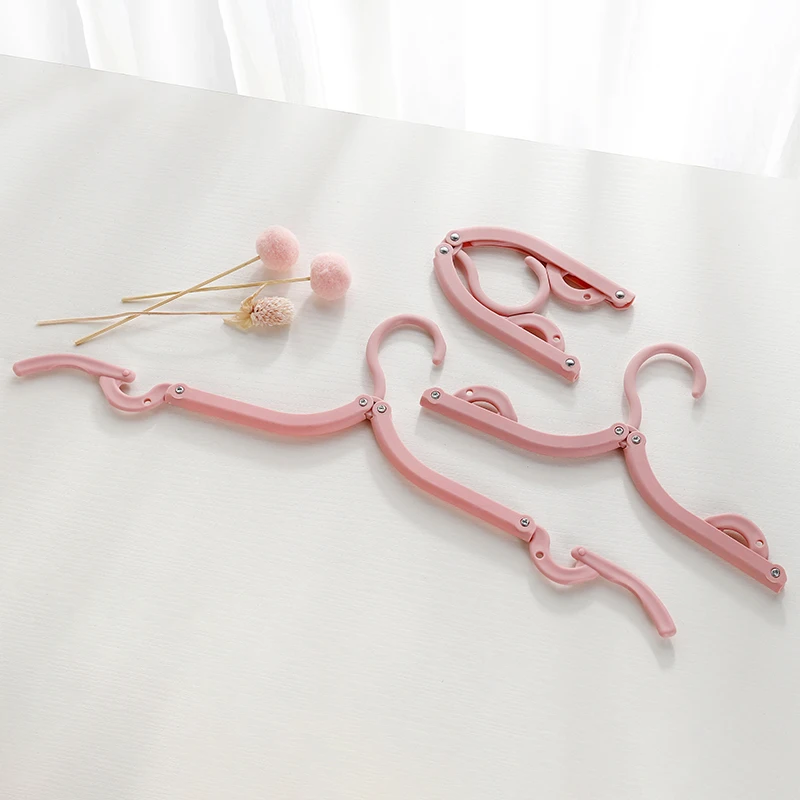 

High Quantity Outdoor Portable Folding Plastic Clothing Coat Travel Foldable Hanger, Pink/green/blue/apricot