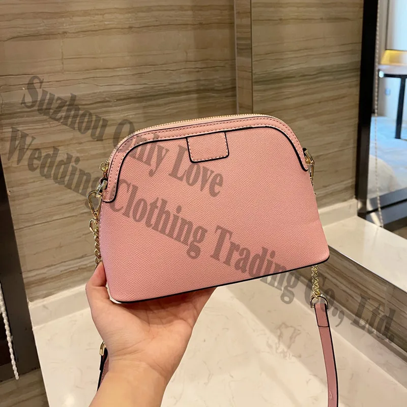 

New 2021 Top Quality Girl Shell dumplings One Shoulder Bag Real Leather Zipper Clutch Lady Armpit bag Women Summer Hand Bags