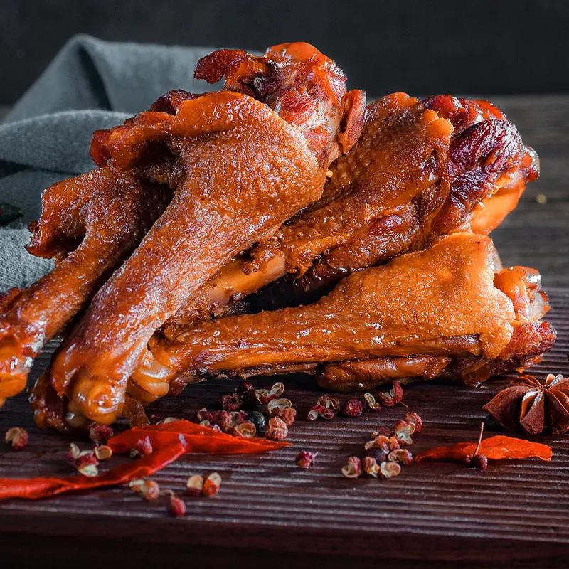 
ShuDaoXiang Hot Spicy Braised Duck Legs Spicy Food 100g Yaxiaotui OEM Roast Duck Snack Wholesale China Duck Legs 