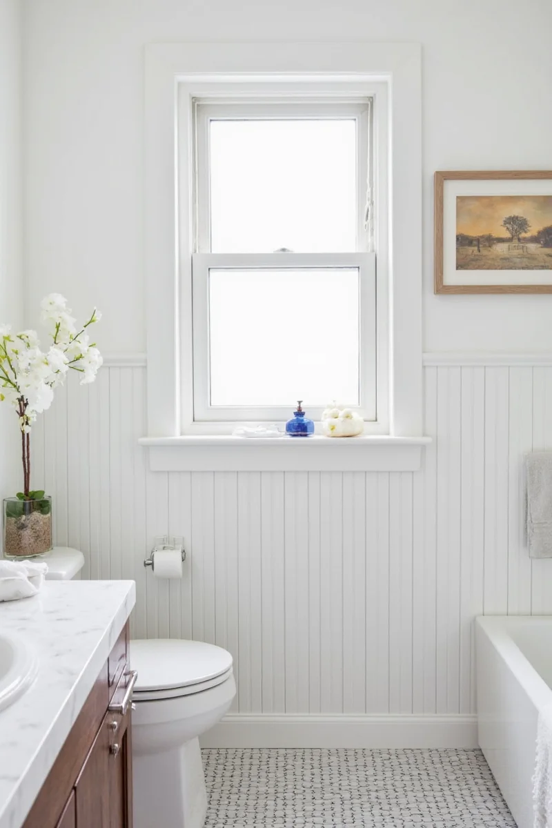 Farmhouse-style bathroom with wood beadboard