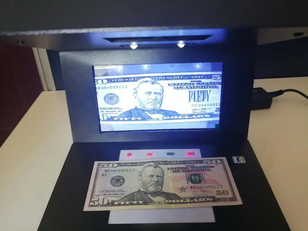 
Hot sell IR,UV,MG ,White Mark counterfeit money detector 