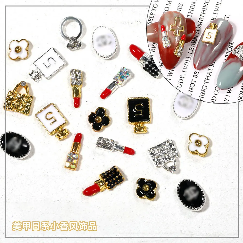 

Japanese small fragrance nail jewelry logo metal drop oil pearl flower lipstick tower perfume bottle alloy nail art, Picture shows