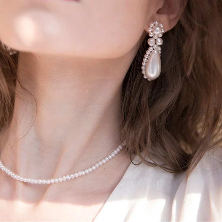 

Aimgal Jewelry 18 karat gold plated fresh water pearl necklace with pearl clavicle chain for women