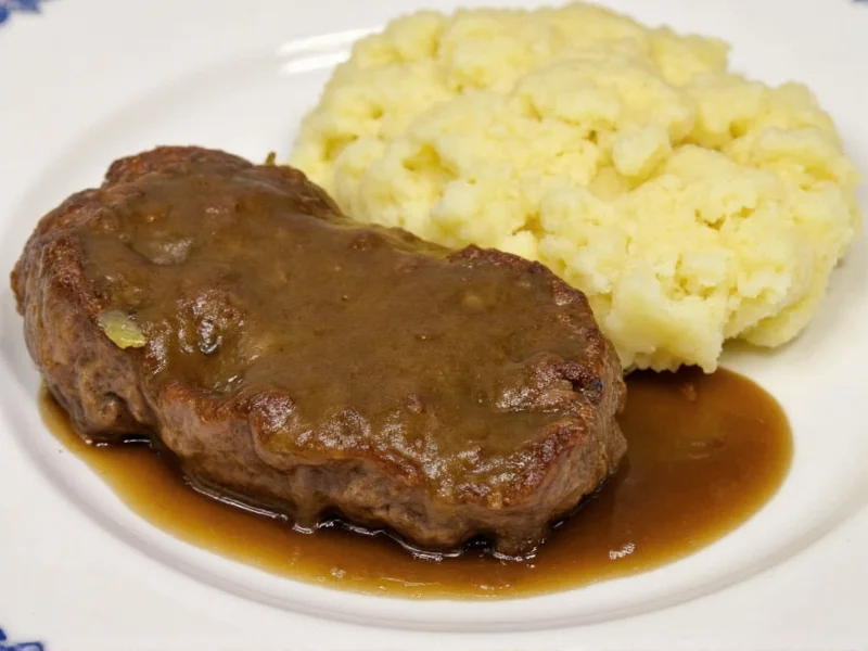 Homemade Salisbury steak served with mashed potatoes