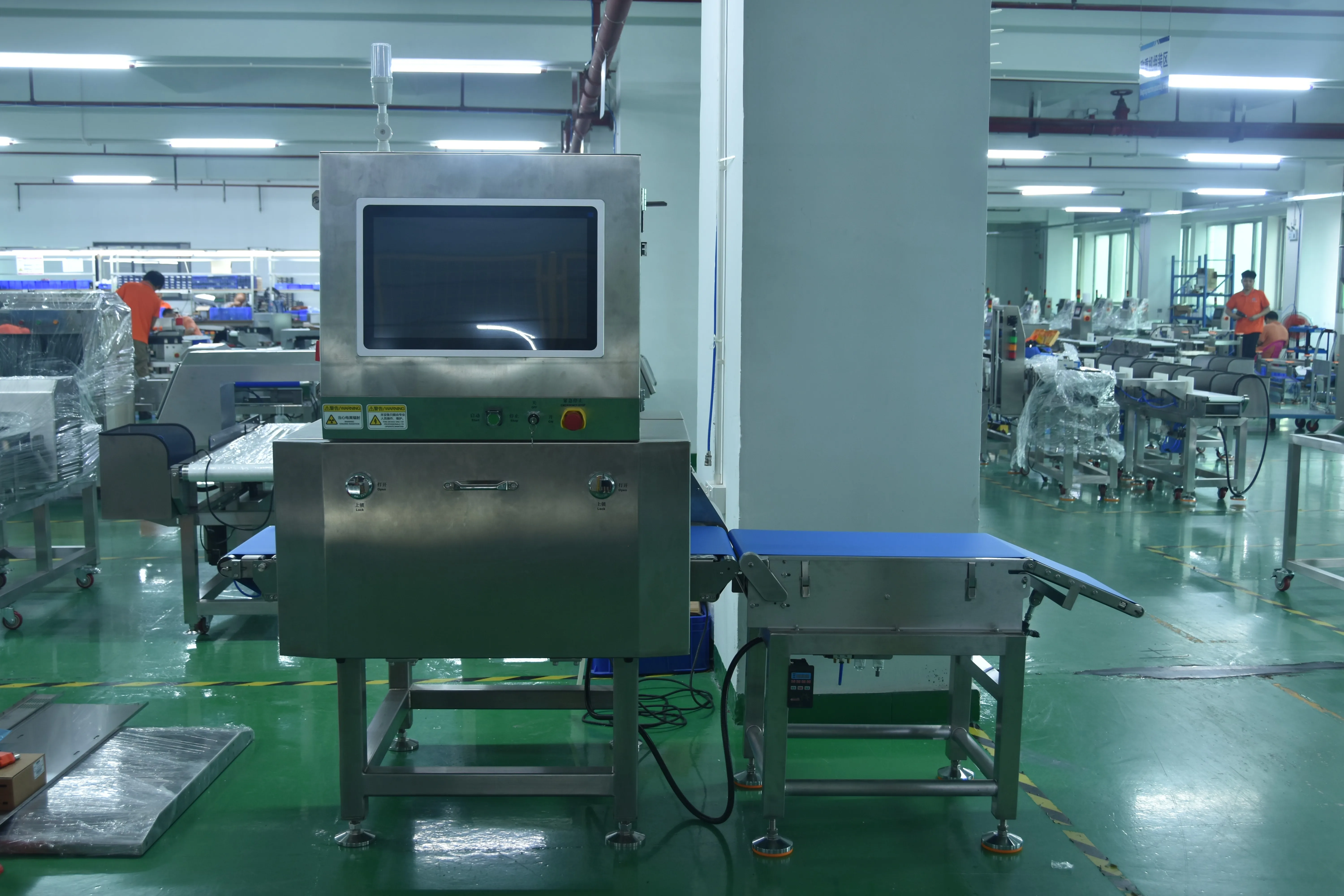 CQ-YW800 X-ray machine with split conveyor on the production floor