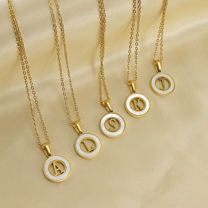 

2023 Wholesale 304 Stainless Steel 26 Letters Initial Necklace Hollow Round White Shell Necklace 18K Gold for women