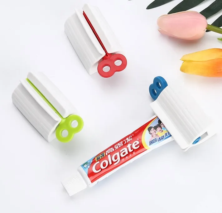 

GO-STD Home Bathroom Plastic Easy Tube Rolling Holder Toothpaste Dispenser Tooth Paste Squeezer dispenser, Red and blue green