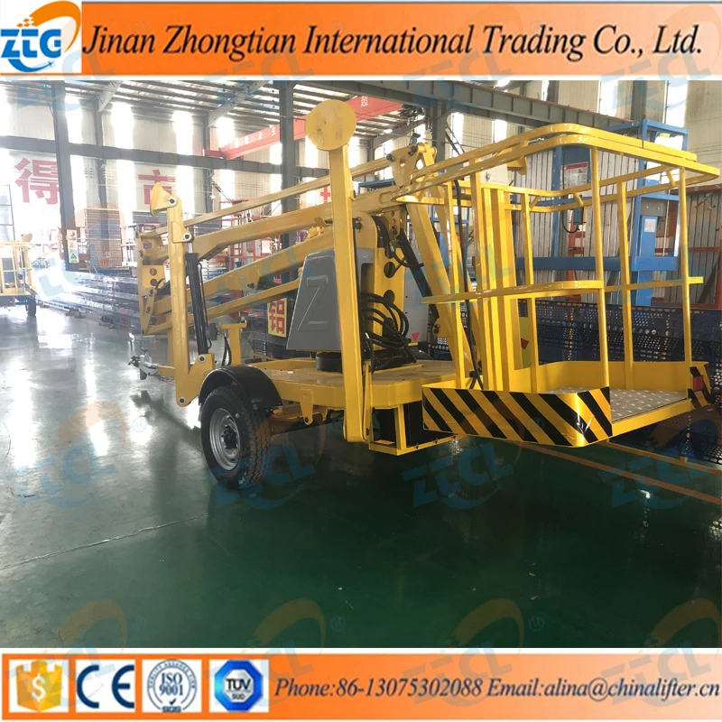 Towables boom lift tables