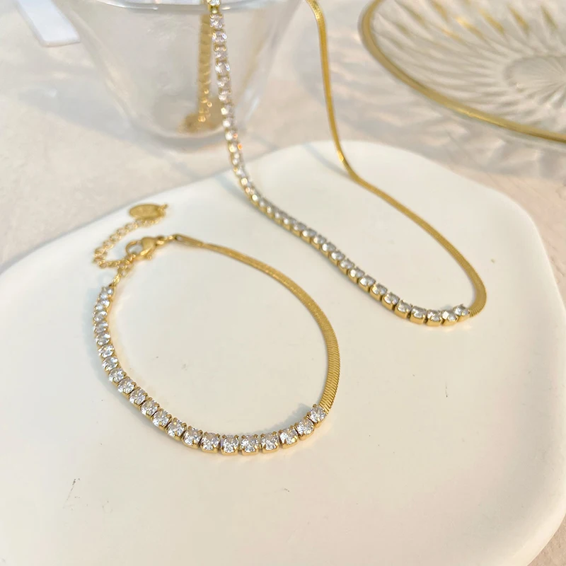 

2024 new gold-plated stainless steel fashion dazzling rhinestone inlaid snake bone chain stitching necklace Bracelet jewelry set
