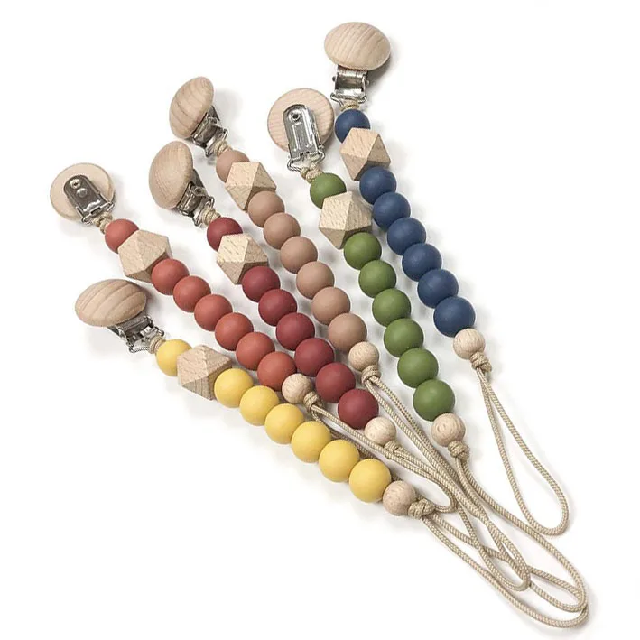 

Safety Toddler Baby Pure Color Silicone Teething Dummy Pacifier Clip Wooden Soother Holder