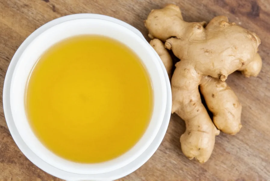 Various ingredients for ginger tea customization arranged around a steaming mug