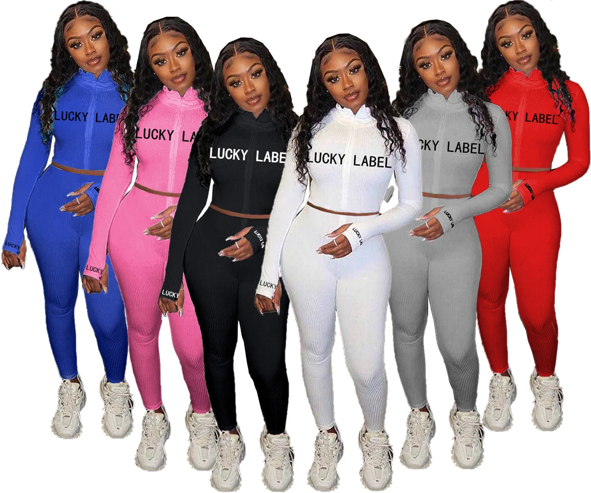 

2021 Spring hot selling lucky label two piece set letter printing tracksuits long sleeve thumb hole outfit drop shipping