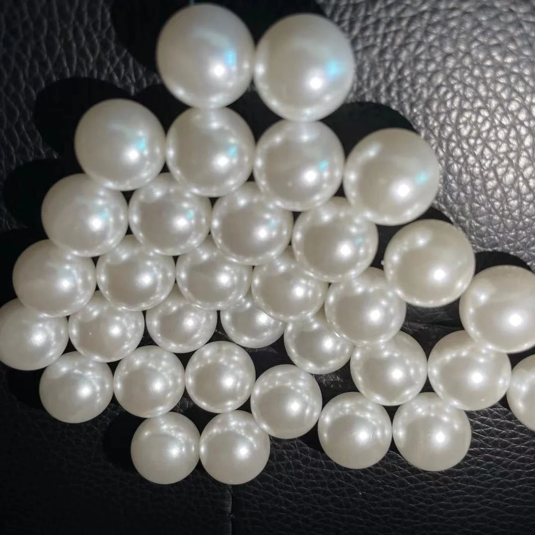 

Longyao Large supply of shell pearl 3-18mm white half hole shellfish DIY jewelry accessories loose beads wholesale particles, Color white.pearl white
