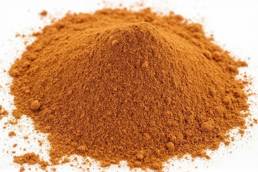 Close-up of Ceylon cinnamon powder showing fine texture compared to coarser cassia powder