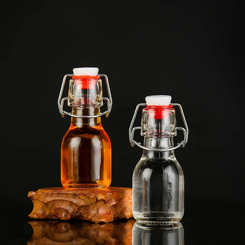 
Wholesale buckle bottle mini glass empty bottle 60ml thick small size wine bottle with lid 