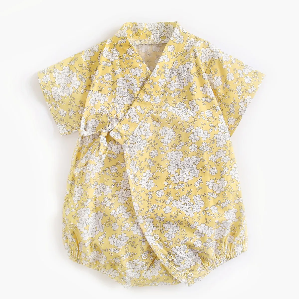 

2021 Children's Summer New Yellow Floral UAE Style Strap V-Neck Suit Design Climbing Jacket