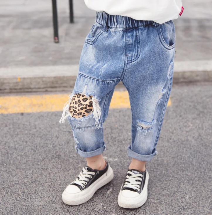 

Children's pants foreign trade children's wear 2021 spring Korean edition girl leopard print ripped jeans