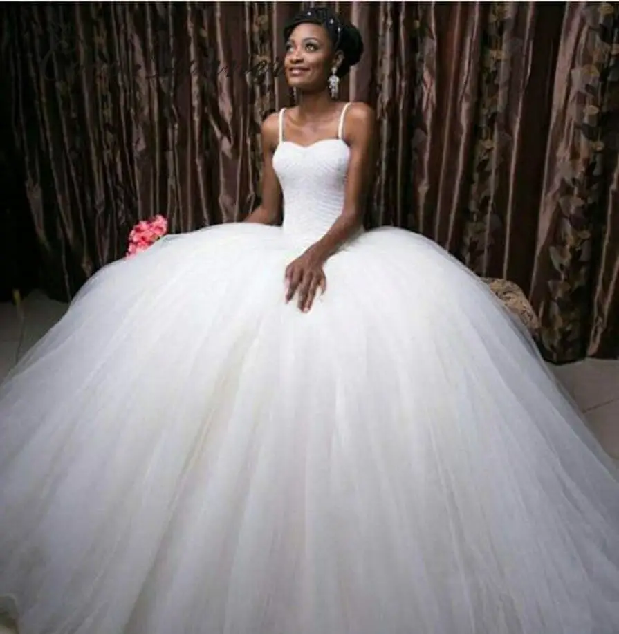 

Custom Made Spaghetti Neckline Sweetheart Pearls Beading Luxury Wedding Dresses Puffy Ball Gown Africa