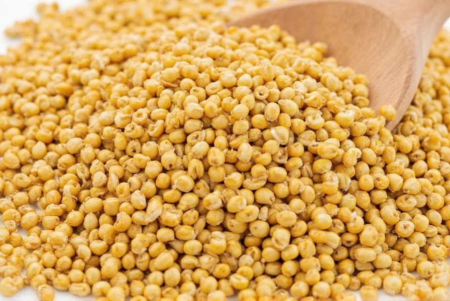 Close-up of fenugreek seeds and fresh fenugreek leaves on wooden background