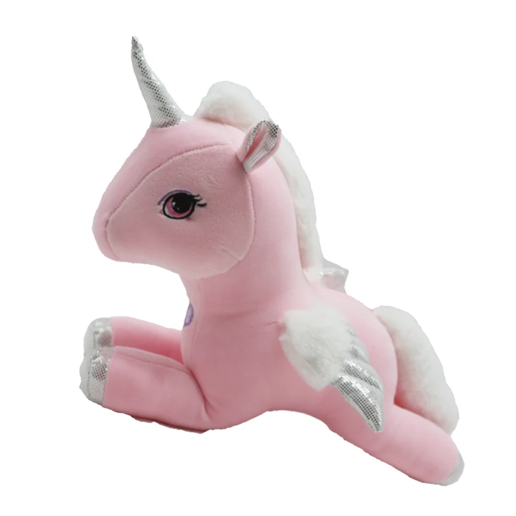 small pink unicorn stuffed animal