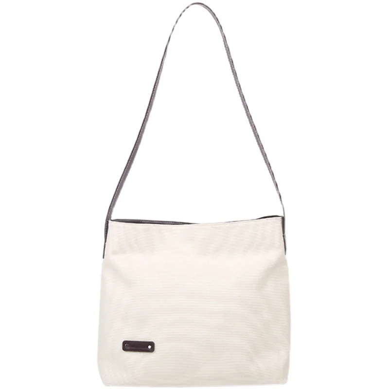 

Eco friendly Japanese canvas shopping bag slung across the body