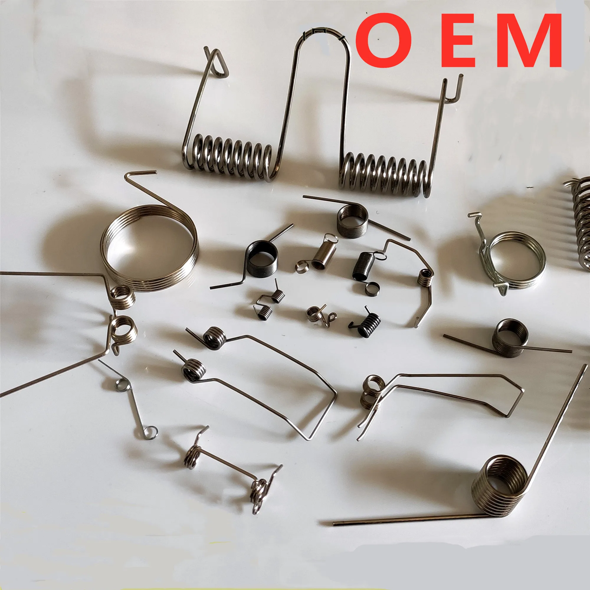 

Stainless Steel Flat Coil Lock Spring Torsion Springs For Door Handles