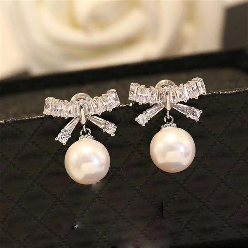 

Women Earrings Bowknot Shape Crystals And Big Beautiful Beads Attractive Female Jewelry