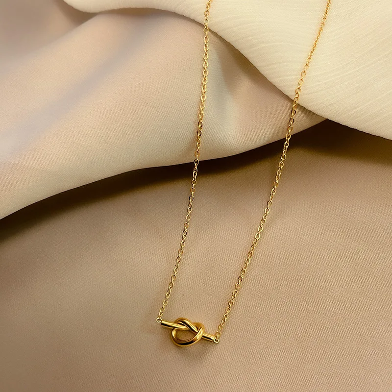 Fashion Hot Sale Luxury Gold Plated Stainless Steel Necklace Vintage Fashion Heart Knot Necklace For Women And Girls