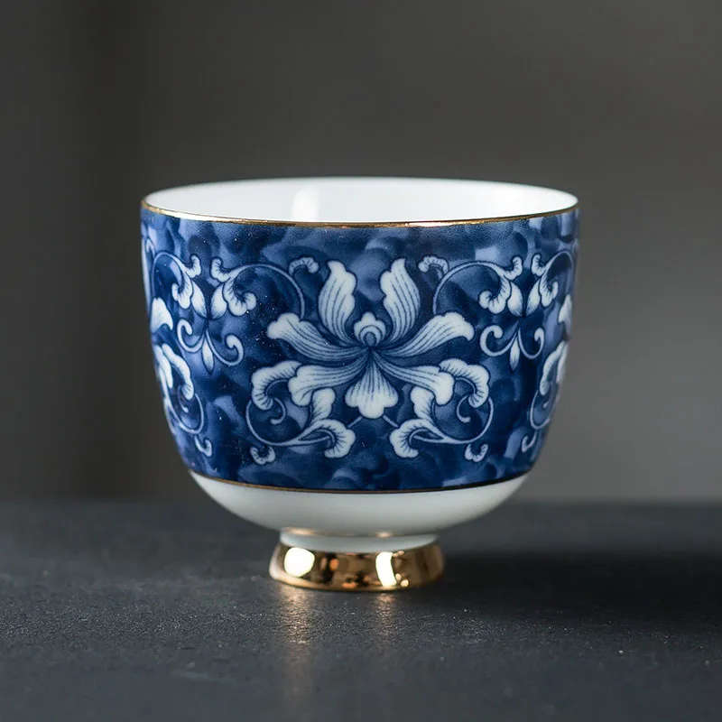 Ceramic porcelain bule and white  handpainted gold line teacup and saucer sets
