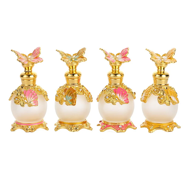 

hot selling high end fancy design 15ml Metal Alloy Patented Butterfly Empty Glass Antique Essential Oil Arabic Perfume Bottles