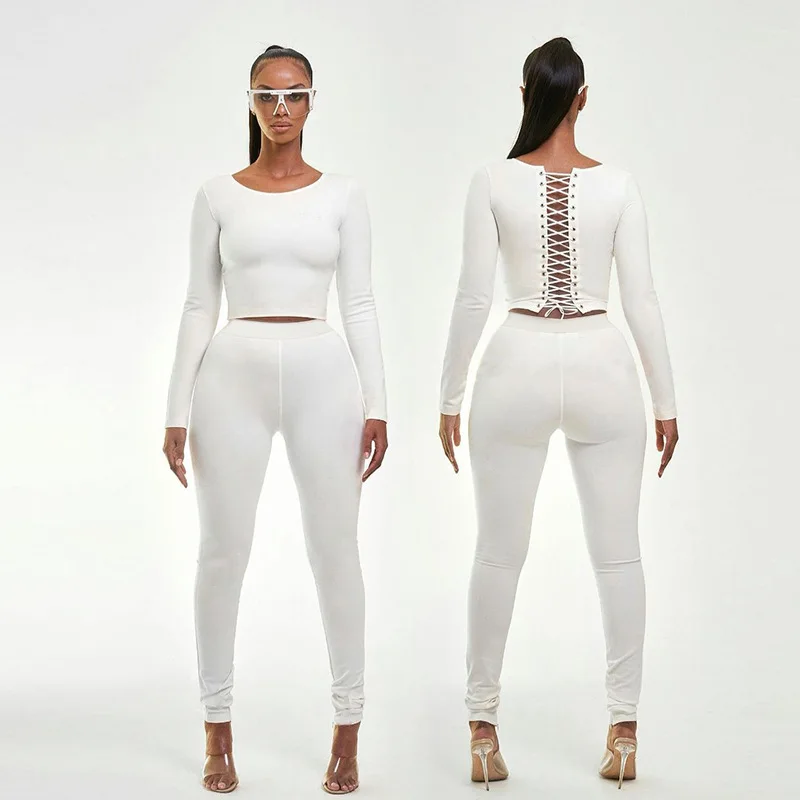

Wholesale Bodycon Casual new arrival hollow out bandage long sleeve outfits women custom logo two piece pants set