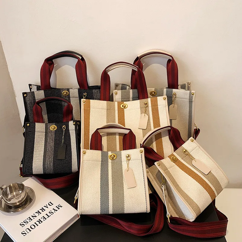 

Hot-selling canvas stripe handbags 2021 new fashion portable tote bag popular size retro one-shoulder messenger bags for women, Picture