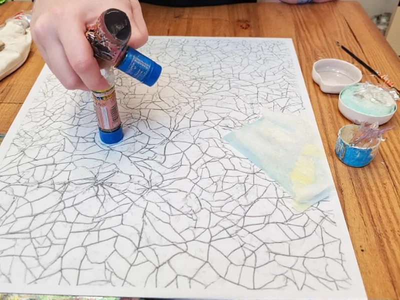 Applying web pattern with fabric paint and vinyl stencil