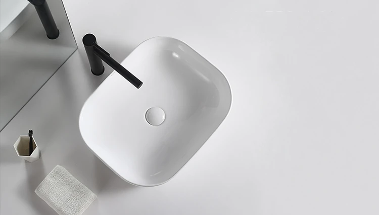 Modern Sanitary Wares White Bathroom Oval Shaped Counter Ceramic Art Wash Basin