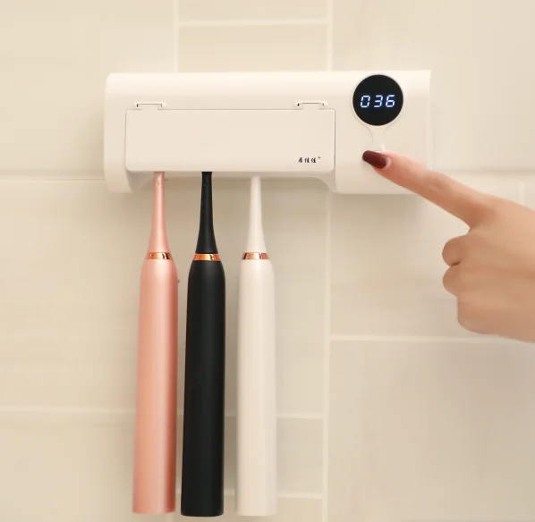 
2020 home intelligent LED wall mounted toothbrush holder for electric toothbrushes sterilize uv light USB toothbrush sterilizer 