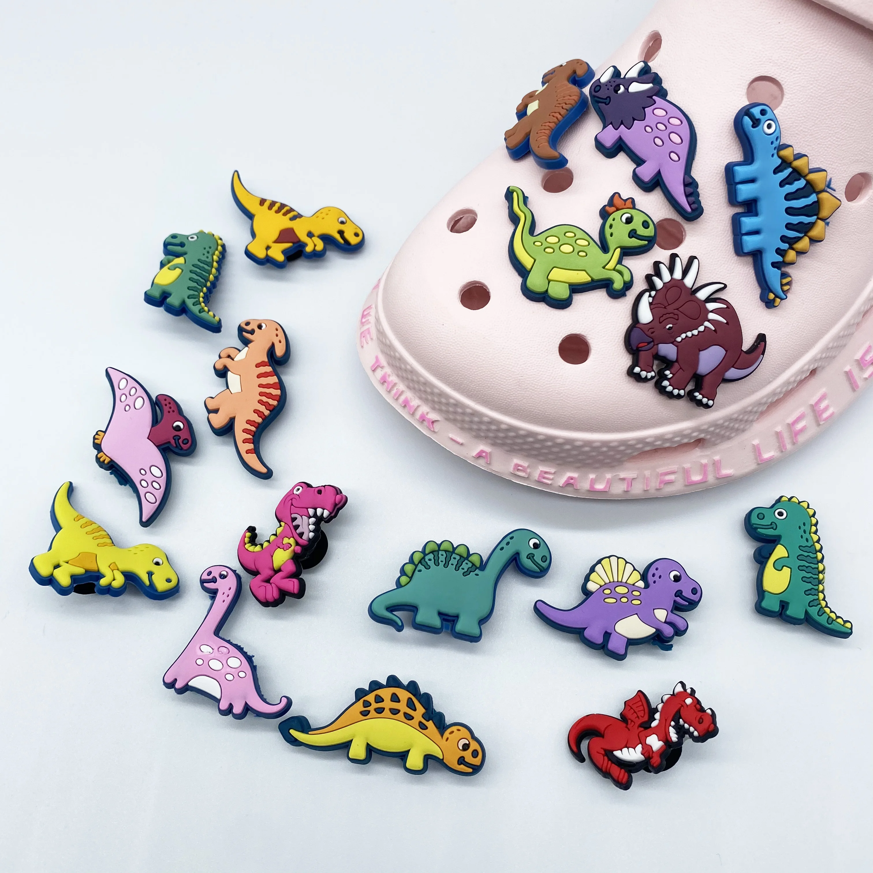 

Fast shipping factory direct new style custom logo Jurassic series PVC cartoon dinosaur kids croc decorative shoes charms