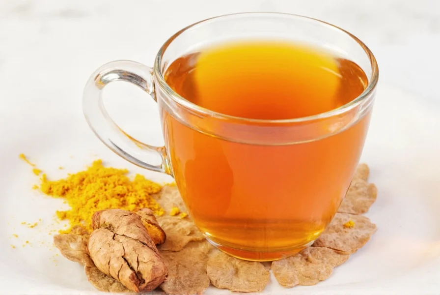 Turmeric tea ingredients including fresh ginger, lemon slices, and cinnamon sticks