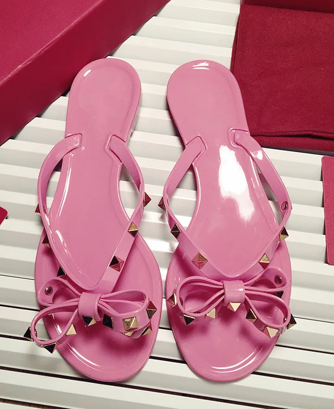 

2022 summer new women's shoes rivet bow sandals flat non-slip sandals and slippers rivet jelly beach sandals