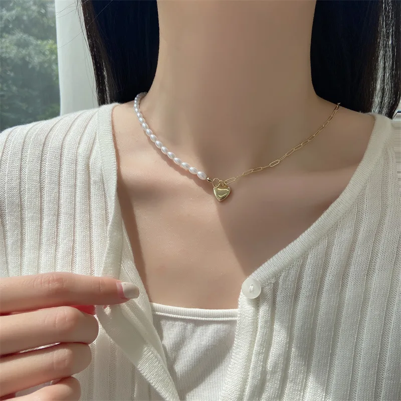 

Asymmetric stitching clavicle chain love pendant necklace female ins niche design sense of simplicity