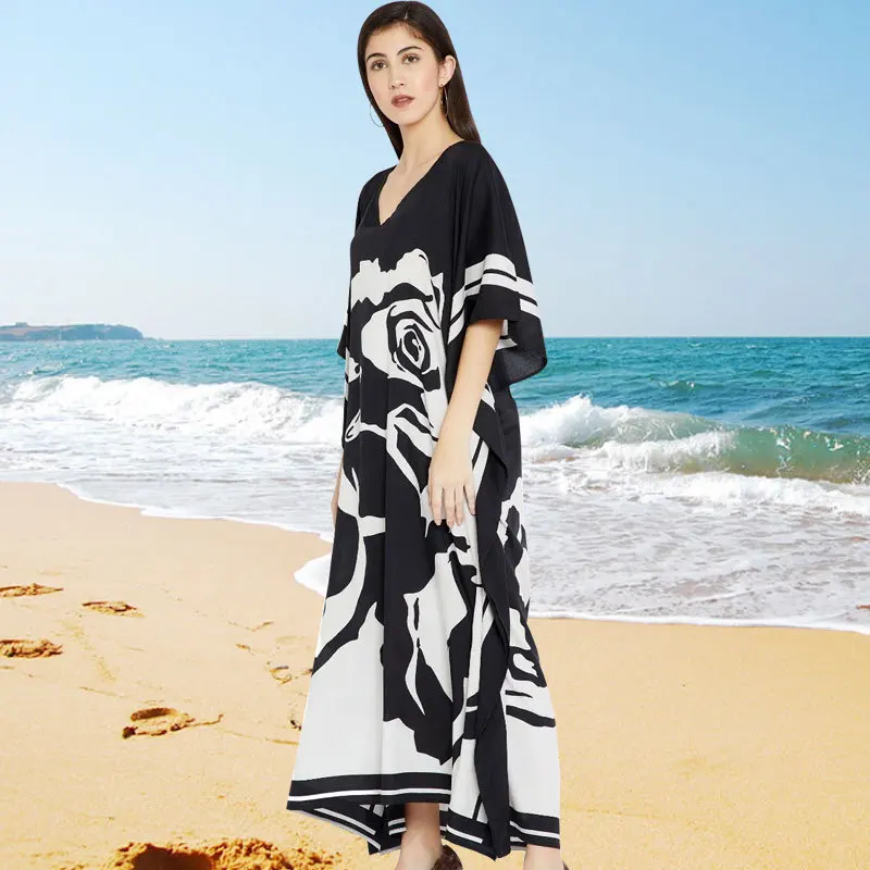 

Wholesale 2021 spring and summer leisure loose flower loose long skirt beach sunscreen swimsuit blouse outer robe holiday dress