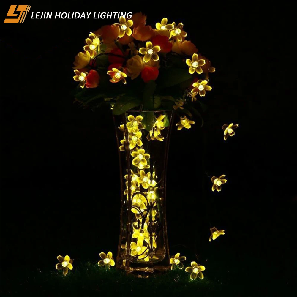 christmas led string light with flower decorations