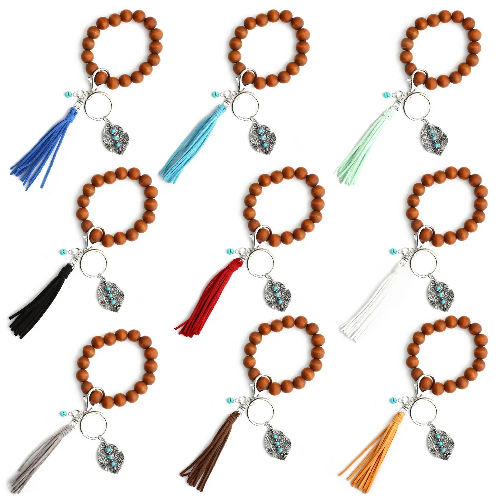 

Vintage Wooden Round Beaded Decorative Bracelet Bohemian Leather Tassel Alloy Leaf Turquoise Pendant Keychain