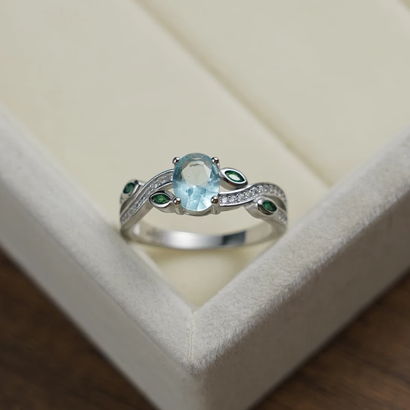

Hot sales in Europe and the charm fashion 925 sterling silver cross ring platinum zircon ms sky blue round crystal jewelry gifts